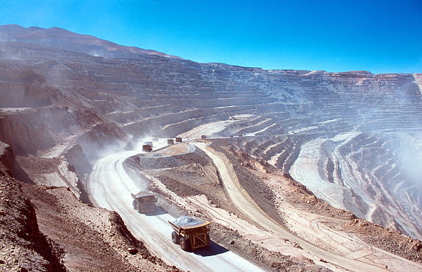 Ore trucks in an open-pit mine. Calama, Atacama desert. North Chile